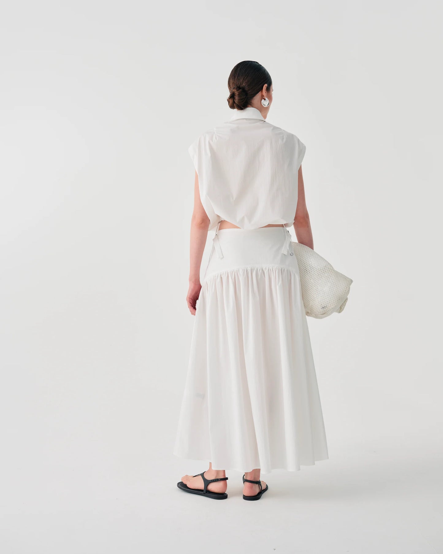 WHITE MIDI SKIRT WITH SIDE BUCKLES