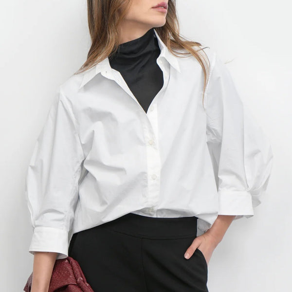THEA BUTTON DOWN